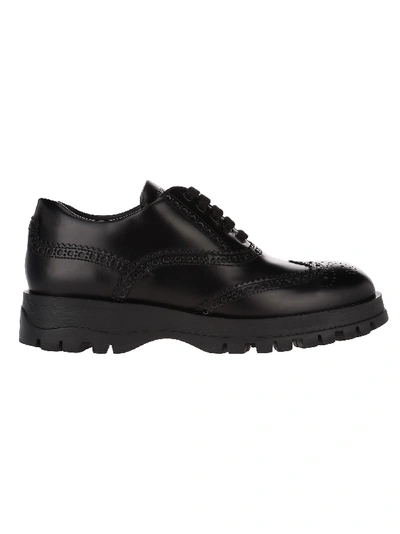 Shop Prada Brogue Laced Shoes In Black