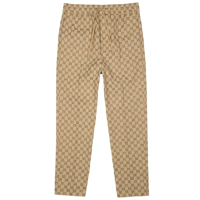 Shop Gucci Gg Monogrammed Cotton-blend Sweatpants In Beige