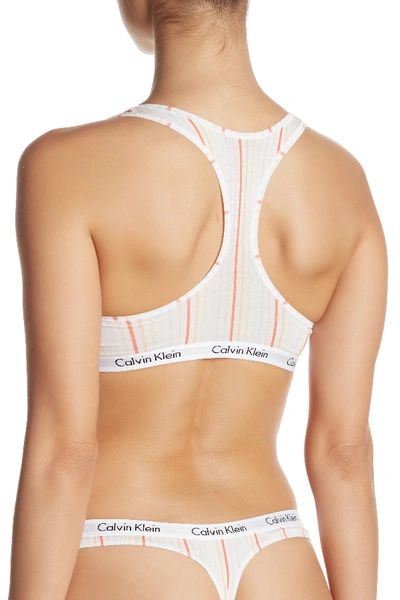 Shop Calvin Klein Carousel Racerback Bralette In Psn Prd Strp So