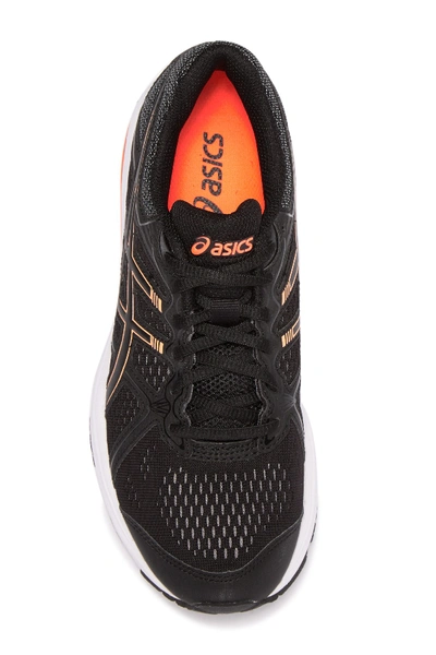 Shop Asics Gt-xpress Running Sneaker In Black / Mo