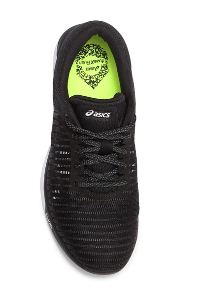 Shop Asics Fuzex Rush Adapt Running Sneaker In Blk/white/