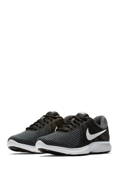 Shop Nike Revolution 4 Running Sneaker In Black/white