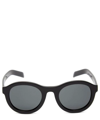 Shop Prada Chunky Round Acetate Sunglasses In Black