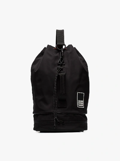 Shop Ganni Black Triple Strap Drawstring Backpack