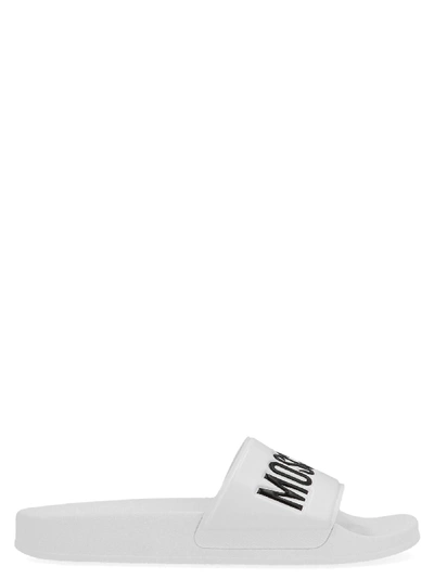 Moschino Embossed Logo Pool Slides In White