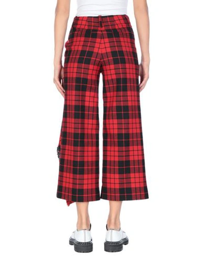 Shop Monse Pants In Red