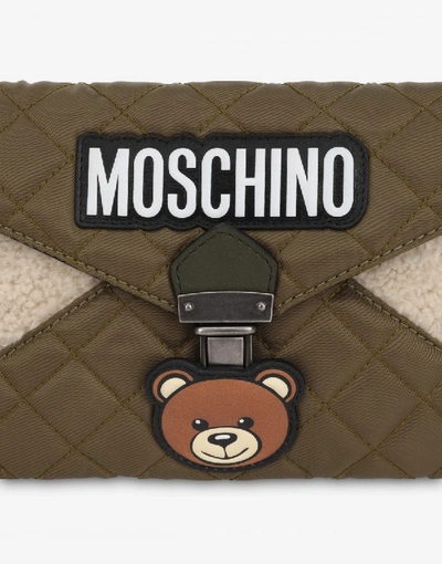 Shop Moschino Ecofur And Nylon Teddy Pocket Clutch In Military Green