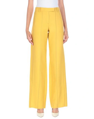Shop Valentino Casual Pants In Ocher