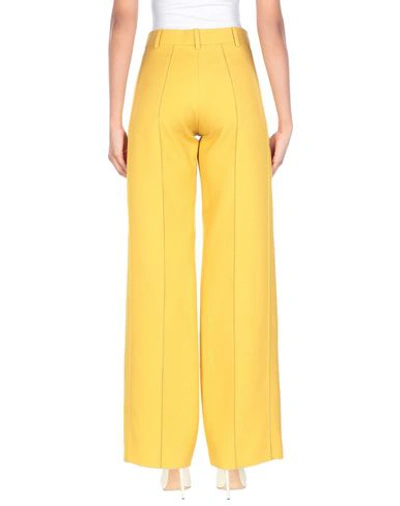 Shop Valentino Casual Pants In Ocher