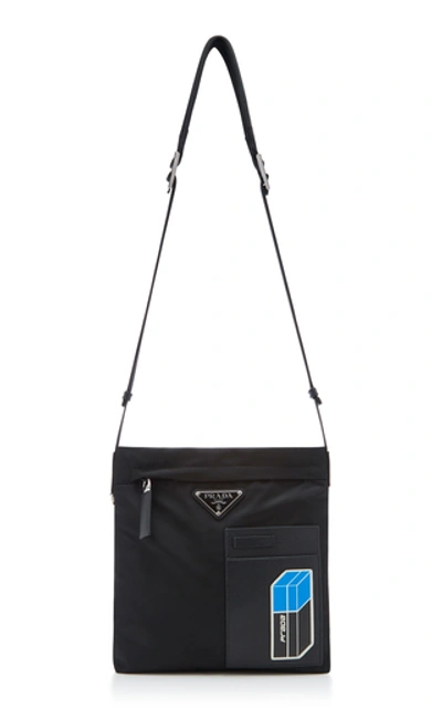 Shop Prada Leather-trimmed Shell Messenger Bag In Black