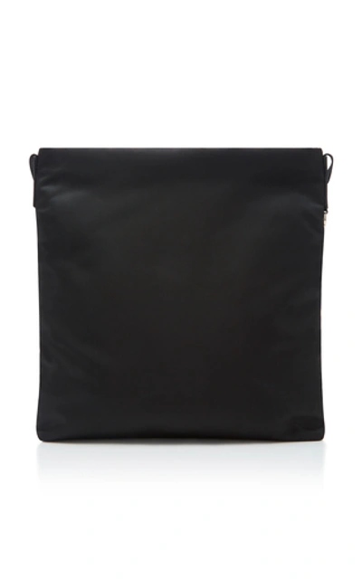 Shop Prada Leather-trimmed Shell Messenger Bag In Black