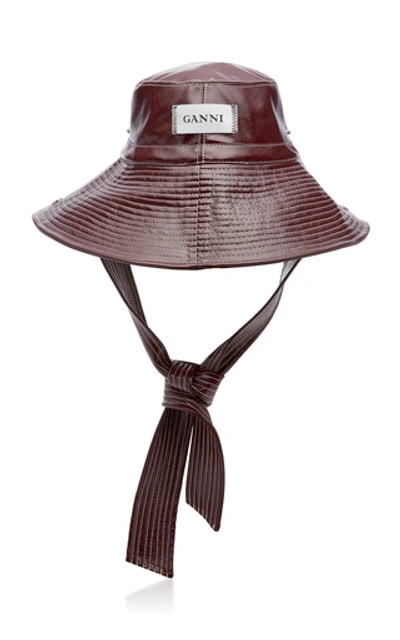 Shop Ganni Logo-patch Patent Bucket Hat In Brown