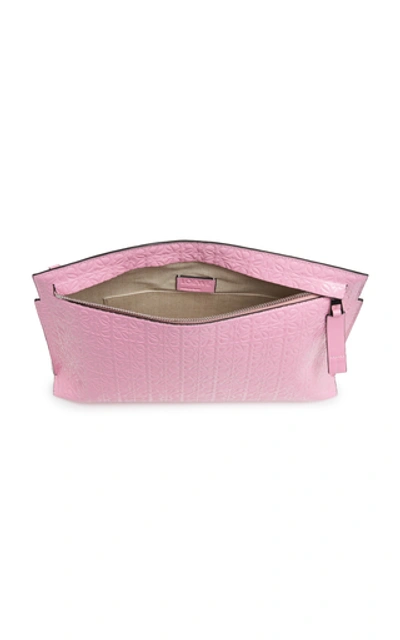 Shop Loewe T-pouch Repeat Embossed Leather Clutch In Pink