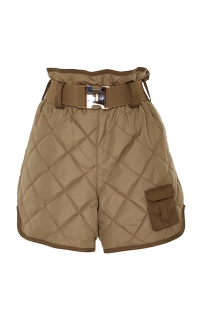 Shop Ganni Belted Quilted Shell Shorts In Green
