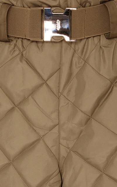 Shop Ganni Belted Quilted Shell Shorts In Green