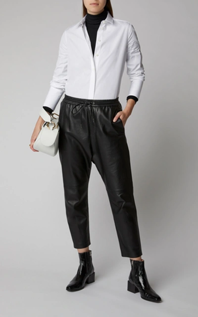 Shop Nili Lotan Monaco Cropped Leather Slim-leg Pants In Black