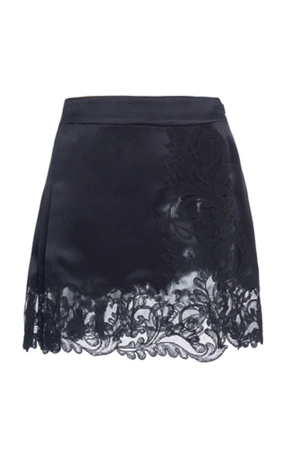Shop Versace Pleated And Lace-paneled Silk-satin Mini Skirt In Black