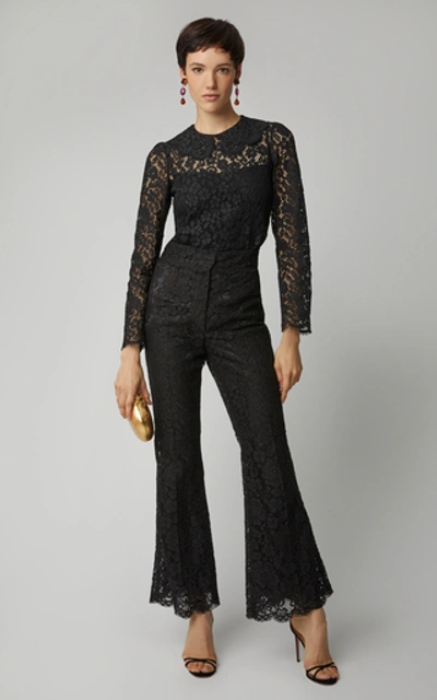 Shop Dolce & Gabbana Flared High-rise Lace Trousers In Black