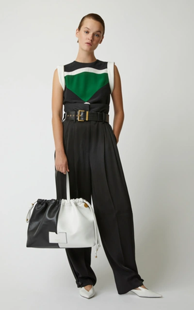 Shop Givenchy High-waisted Pleated Crepe Pants In Black