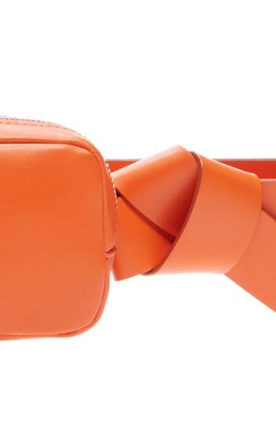 Shop Acne Studios Musubi Knotted Leather Belt Bag In Orange