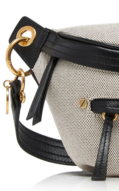 Shop Givenchy Whip Leather-trimmed Canvas Belt Bag In Black/white