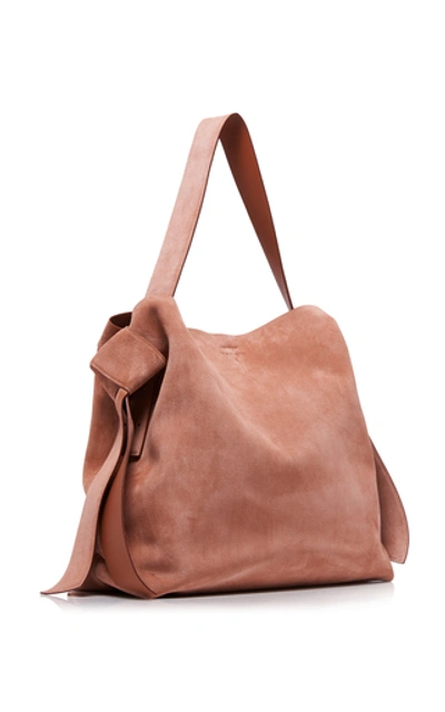 Shop Acne Studios Musubi Maxi Knotted Suede Shoulder Bag In Pink