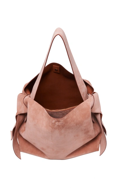 Shop Acne Studios Musubi Maxi Knotted Suede Shoulder Bag In Pink