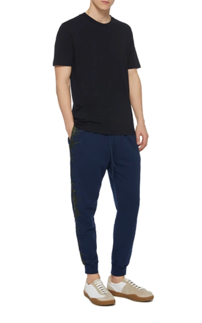 Shop Haider Ackermann Embroidered Cotton Joggers In Blue