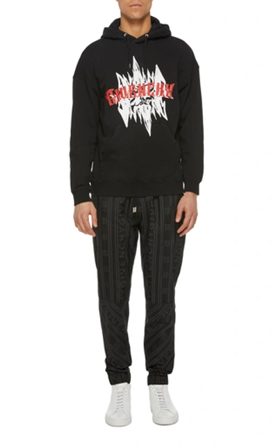 Shop Givenchy Printed Cotton-jersey Hooded Sweatshirt In Black