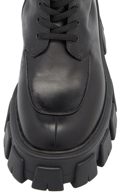 Prada Monolith Nylon Pocket-detailed Leather Combat Boots In Black