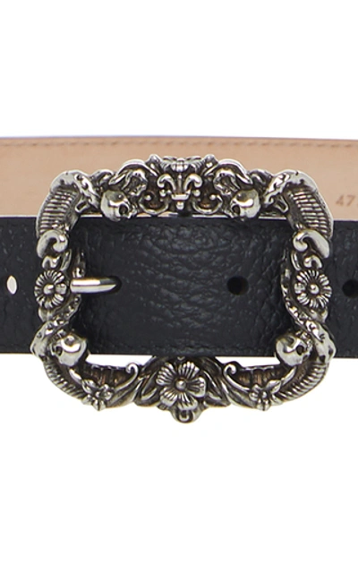Shop Alexander Mcqueen Engraved Buckle Leather Belt In Black