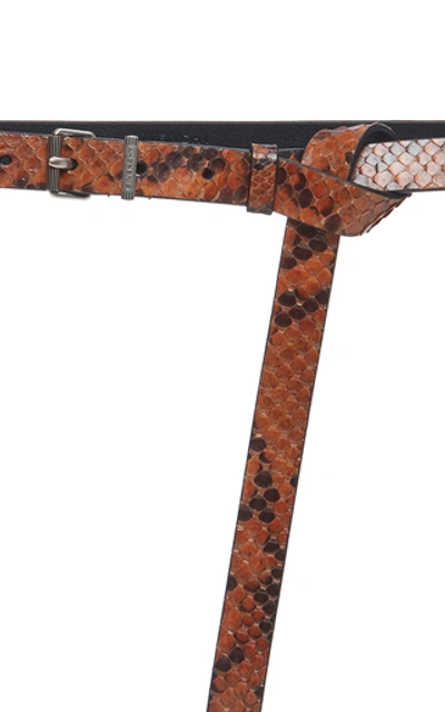 Shop Givenchy Skinny Roll-buckle Python Belt In Brown