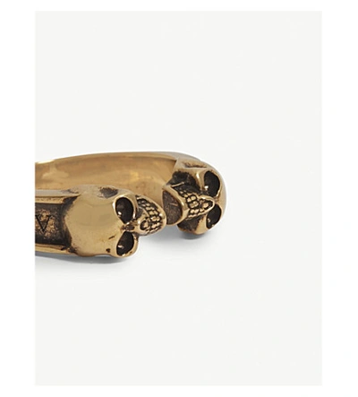 Shop Alexander Mcqueen Skull Brass Ring In Gold