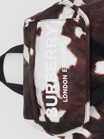Shop Burberry Cow Print Nylon Backpack In Mahogany