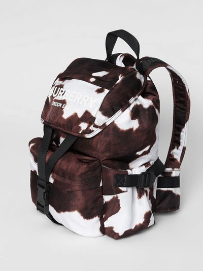 Shop Burberry Cow Print Nylon Backpack In Mahogany