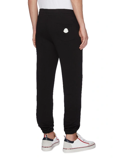 Shop Moncler Logo Stripe Outseam Jogging Pants In Black