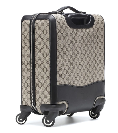 Shop Gucci Gg Supreme Carry-on Suitcase In Brown