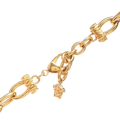 Shop Versace Charm Necklace In Gold