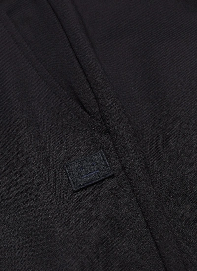 Shop Acne Studios Face Patch Button Cuff Sweatpants In Black