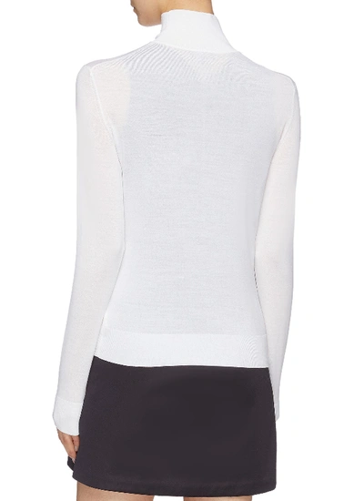 Shop Theory Wool Blend Turtleneck Sweater In White