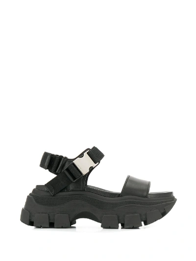Shop Prada Pegasus Sandals - Schwarz In Black