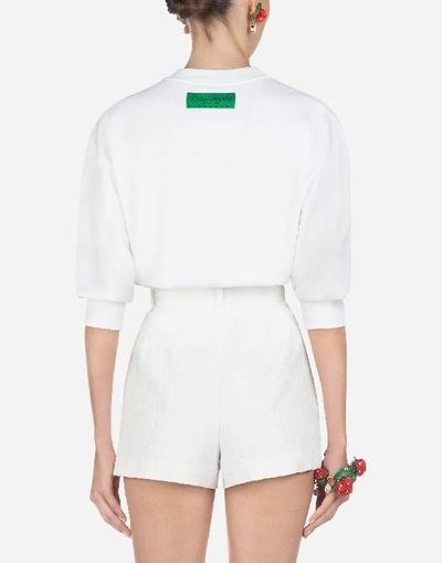 Shop Dolce & Gabbana Cropped Jersey Sweatshirt With Print In White