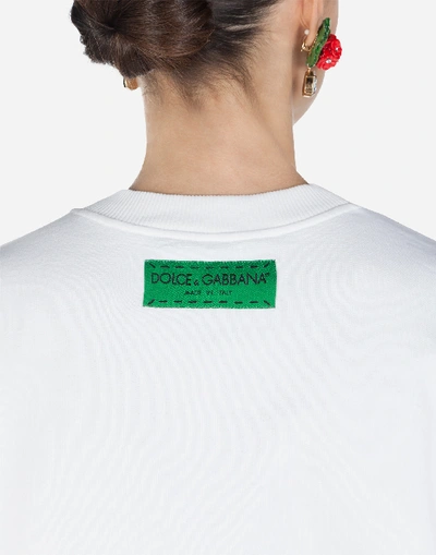 Shop Dolce & Gabbana Cropped Jersey Sweatshirt With Print In White