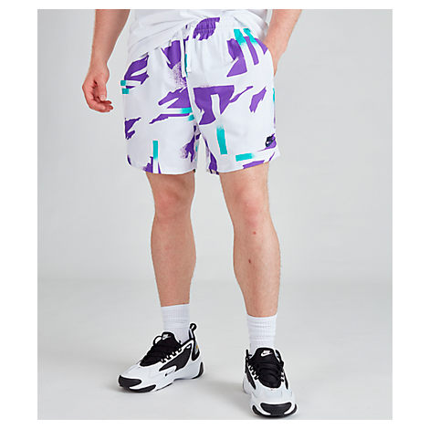 white and purple nike shorts