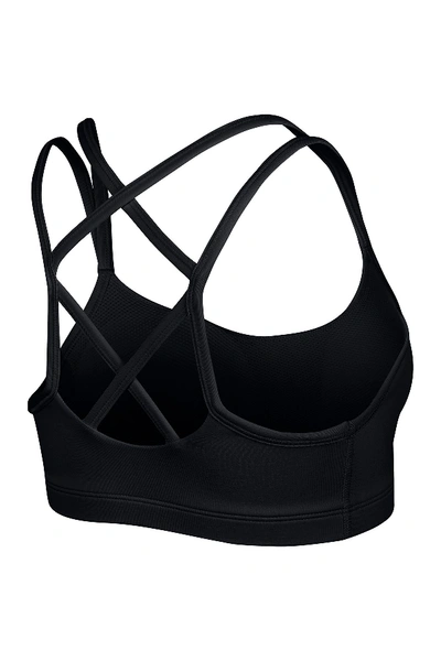 Shop Nike Strappy Dri-fit Sports Bra In Black/white