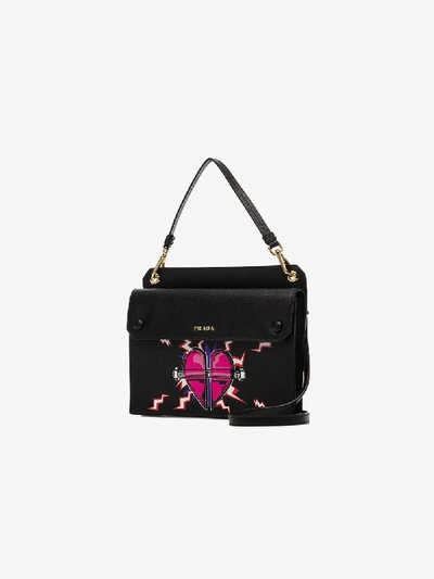 Shop Prada Black Heart Print Top Handle Bag