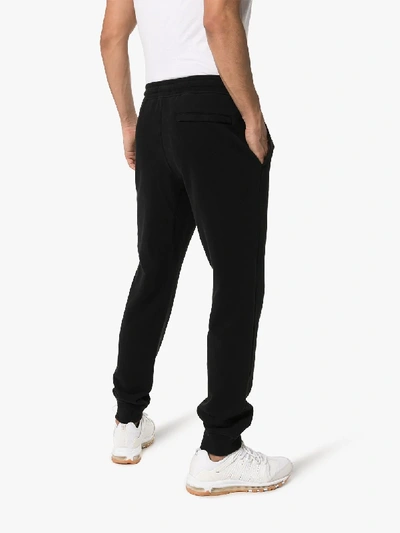 Shop Stone Island Logo Patch Fleece Sweatpants In Black
