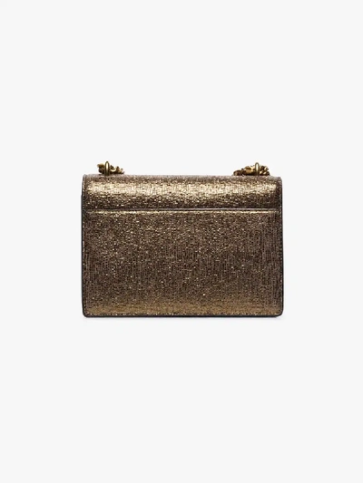 Shop Saint Laurent Gold Small Sunset Metallic Shoulder Bag