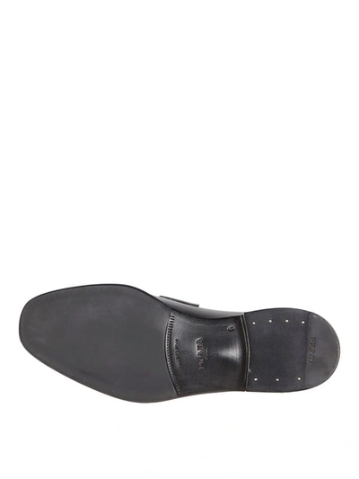 Shop Prada Logo Plaque Polished Leather Loafers In Black