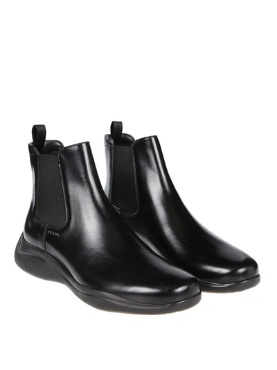 Shop Prada Polished Leather Ankle Boots In Black